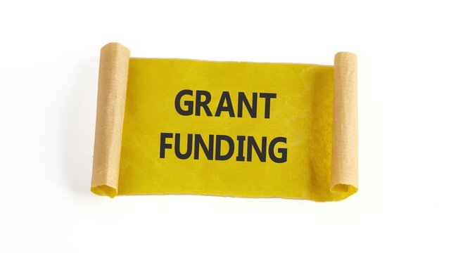 Business and grant funding concept. Business concept. Animation of the GRANT FUNDING concept text on a note on a white background