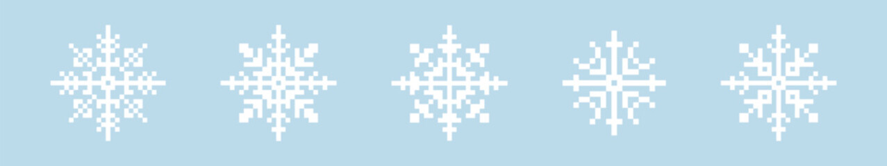 Set of white pixelated snowflakes on a light blue background.