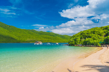 Paradise island beach. Tropical landscape of summer scene, sea. Sunny sand sky palm trees.