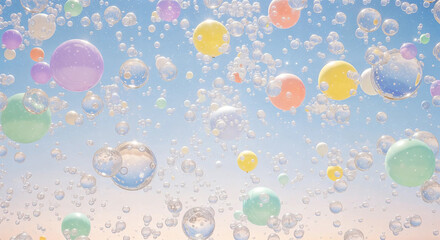 Colorful soap bubbles floating in the bright blue sky on a sunny day