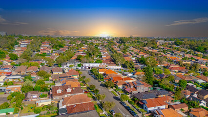 Aerial Panorama Drone View of a inner western Sydney Suburb of Ashbury Urban Sprawl and the terracotta roof tops streets and trees of Suburban Sydney  NSW Australia