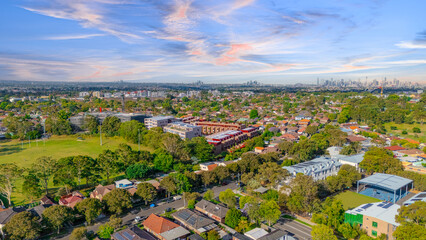 Aerial Panorama Drone View of a inner western Sydney Suburb of Ashbury Urban Sprawl and the terracotta roof tops streets and trees of Suburban Sydney  NSW Australia