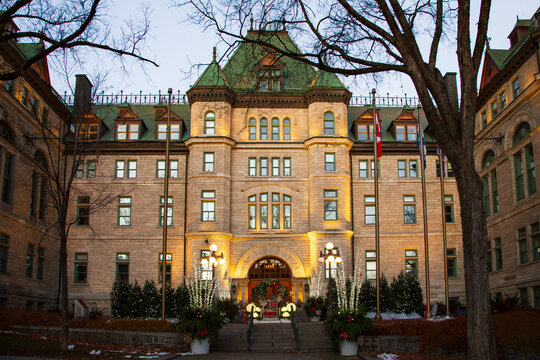 The late 19th Century stone City Hall entrance seen decorated for Christmas from Des Jardins Street in the old town, Quebec City, Quebec, Canada