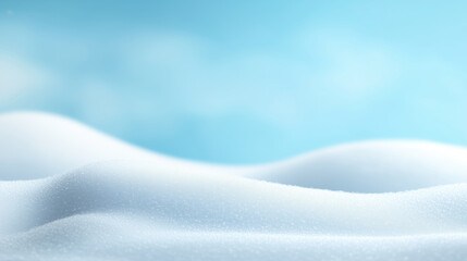 A snowy hillside with a blue sky in the background