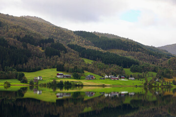 Calm Lakeside Farms Reflected in Oppheimsvatnet, Voss, Norway