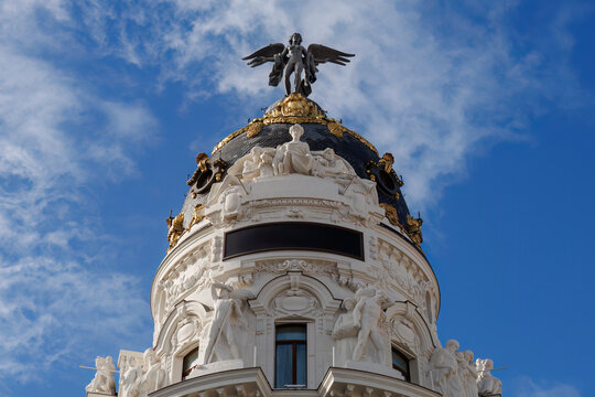 Metropolis building dome with ornate sculptures