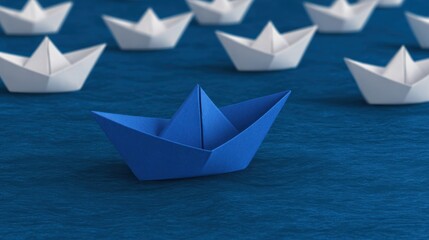 Obraz premium Leading blue paper boat inspires white boats in leadership concept creative environment symbolic viewpoint