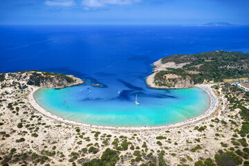 Panoramic aerial view of the popular Voidokilia beach in Messinia, Peloponnese, Greece, situated in a lgaoon with sand dunes and turquoise sea