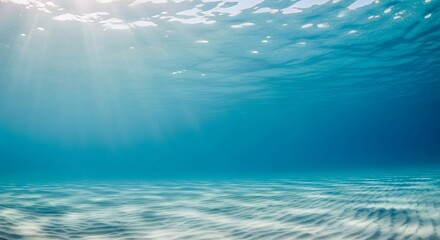 Obraz premium Underwater view with sunlight shining through water