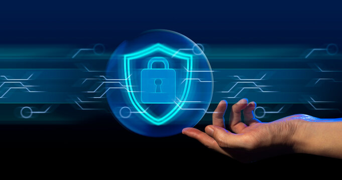 hand of businessman interactive touching a holographic anti-virus security shield system network and technology, success of innovation - Powered by Adobe