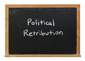 Political retribution written in white chalk on a black chalkboard isolated in a wooden frame
