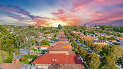 Aerial Panorama Drone View of a inner western Sydney Suburb of Ashbury Urban Sprawl and the terracotta roof tops streets and trees of Suburban Sydney  NSW Australia