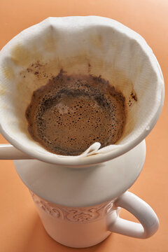 Freshly brewed filter coffee in a white ceramic mug
