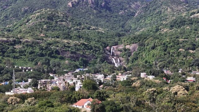 A breathtaking aerial panorama of Courtallam (Kutralam) in the Tenkasi district, Tamil Nadu, India, nestled at the base of the majestic Western Ghats.