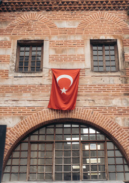 Turkish flag hanging on historic Istanbul building