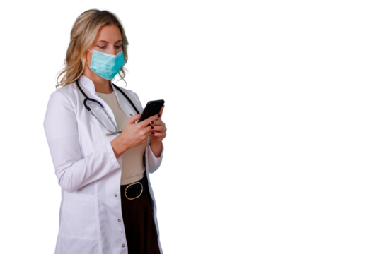 Healthcare professional checking mobile phone. Blonde woman doctor or nurse communicating digitally, offering telemedicine service