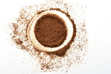 Dry ground chicory in the form of a circle lies on a white background.