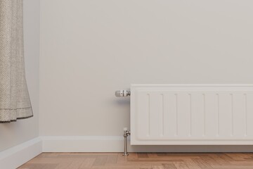 Home radiator with adjustable thermostat valve, close-up for temperature control.