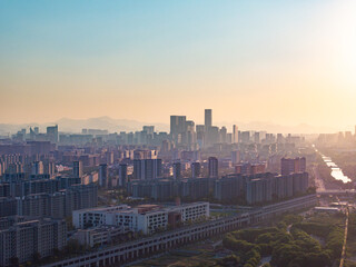 Aerial view of a city at sunset