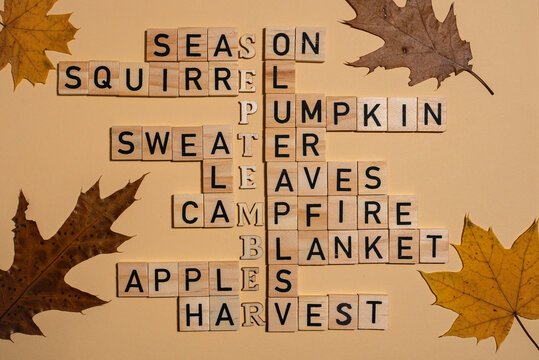 Wooden block crossword featuring autumn related words