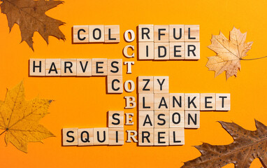 Autumn themed crossword puzzle with wooden blocks