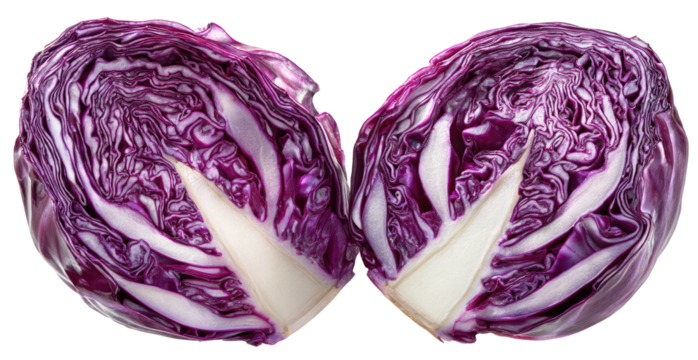 Vibrant red cabbage halved, revealing intricate layers of purple and white