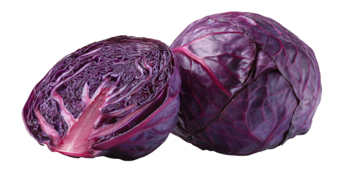 Vibrant purple cabbage, one halved revealing layered texture