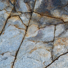 Cool Cracked Grey Rock Face Close-Up Texture