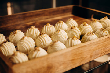 White chocolate truffles in a cafe showcase