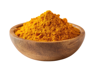 Vibrant yellow spice powder mounded in a simple wooden bowl