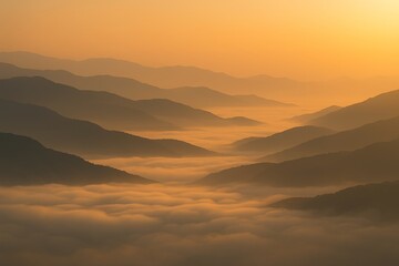 Obraz premium Golden mist rolling across layered hills