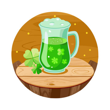 Jarra de cerveza de cristal con cerveza verde y un tr&eacute;bol grabado, s&iacute;mbolo t&iacute;pico de la fiesta de san patricio irlandesa, sobre superficie de madera y fondo verde con bokeh en movimiento See Less