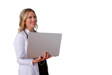 Experienced woman doctor using laptop computer. Presenting telehealth consultation, modern medical technology, and healthcare innovation