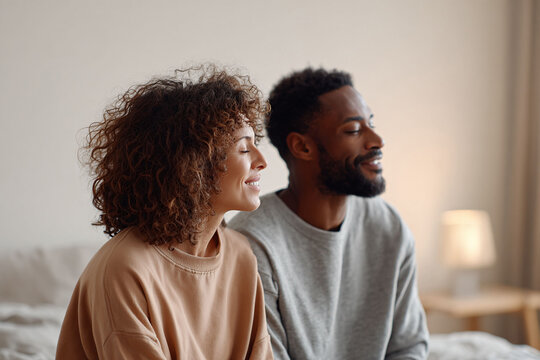 Serene couple meditating together indoors. This image evokes peace, mindfulness, and togetherness. Perfect for wellness, lifestyle, or relationship content.