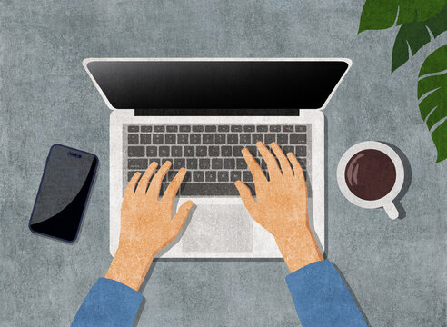 Digital workspace with laptop, phone, and coffee