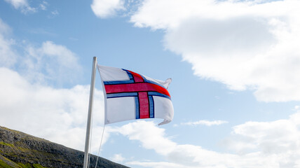 Faroe Islands flag waving against a bright sky