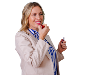 Elegant blonde woman smiling, applying lipstick, getting ready for work or events, focusing on beauty and self-care on transparent background