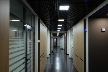 Modern office corridor with stylish design and smooth flooring during daytime hours