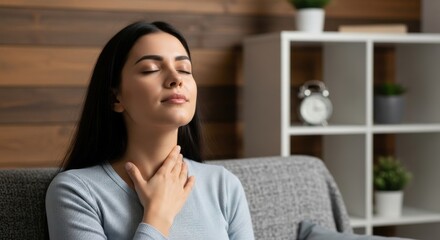 Calm woman practicing deep breathing exercises at home for relaxation and mindfulness