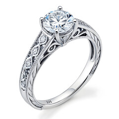 An elegant diamond engagement ring featuring a brilliant-cut stone, polished metal band