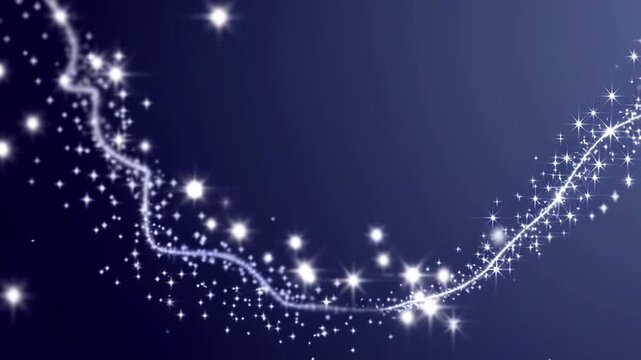 Sparkling star trail curving on dark blue background creating magical glowing motion for holiday design and fantasy overlay use