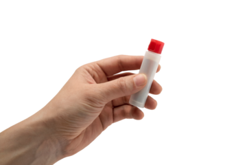 hand holding a tube with a red cap . Isolated on transparent background, png