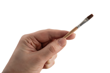 hand holding a flat paintbrush ready to create an artwork . Isolated on transparent background, png