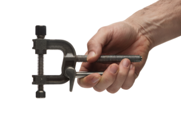 Hand holding clamp, ready for action . Isolated on transparent background, png