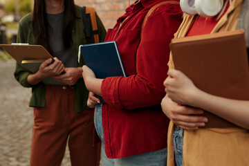 Students collaborating on campus, preparing for classes
