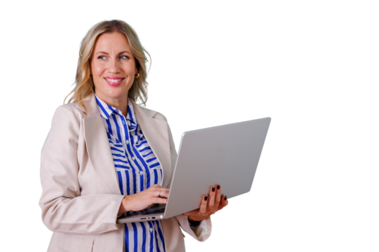 Businesswoman smiling, typing on laptop, networking and communicating, representing remote work success and modern technology