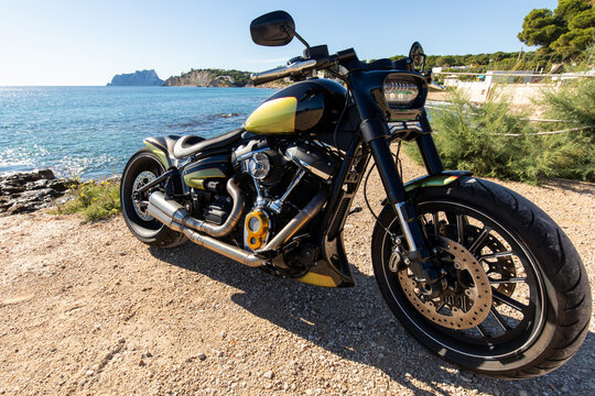 Custom motorcycle near scenic ocean view