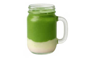 Layered green matcha latte in a glass mug, a refreshing and healthy beverage, showing wellness and detox concept