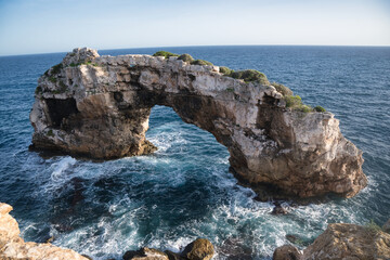 Es Pontàs is a natural arch made of limestone in the southeastern part of the island of Mallorca