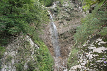 A small, beautiful mountain waterfall